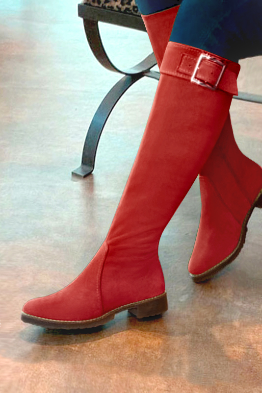 French elegance and refinement for these scarlet red riding knee-high boots, 
                available in many subtle leather and colour combinations. Record your foot and leg measurements.
We will adjust this pretty boot with zip to your measurements in height and width.
Its large, comfortable gum sole will isolate you from the ground.
You can customise the boot with your own materials, colours and heels on the "My Favourites" page.
To style your boots, accessories are available from the boots page. 
                Made to measure. Especially suited to thin or thick calves.
                Matching clutches for parties, ceremonies and weddings.   
                You can customize these knee-high boots to perfectly match your tastes or needs, and have a unique model.  
                Choice of leathers, colours, knots and heels. 
                Wide range of materials and shades carefully chosen.  
                Rich collection of flat, low, mid and high heels.  
                Small and large shoe sizes - Florence KOOIJMAN